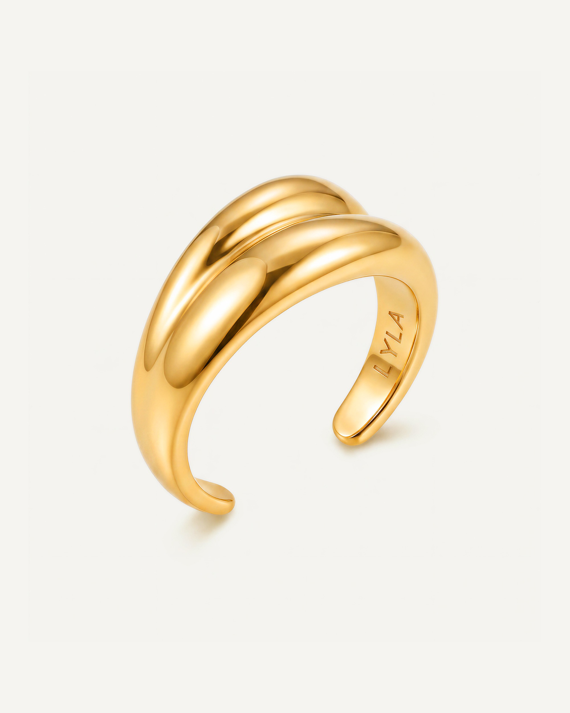 Angled view of gold Swirl Twist Ring