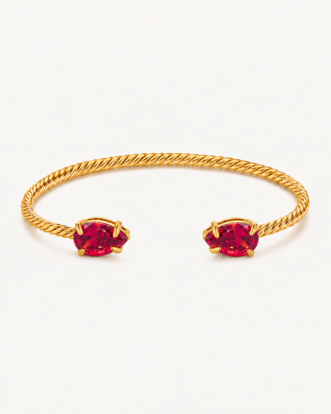 Gold Gem Twist Bracelet with red stones, front view